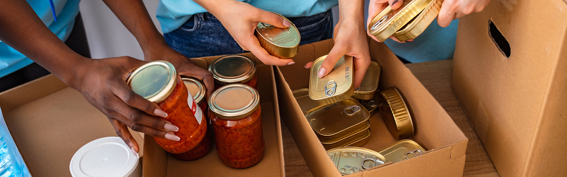 people sorting donated food items